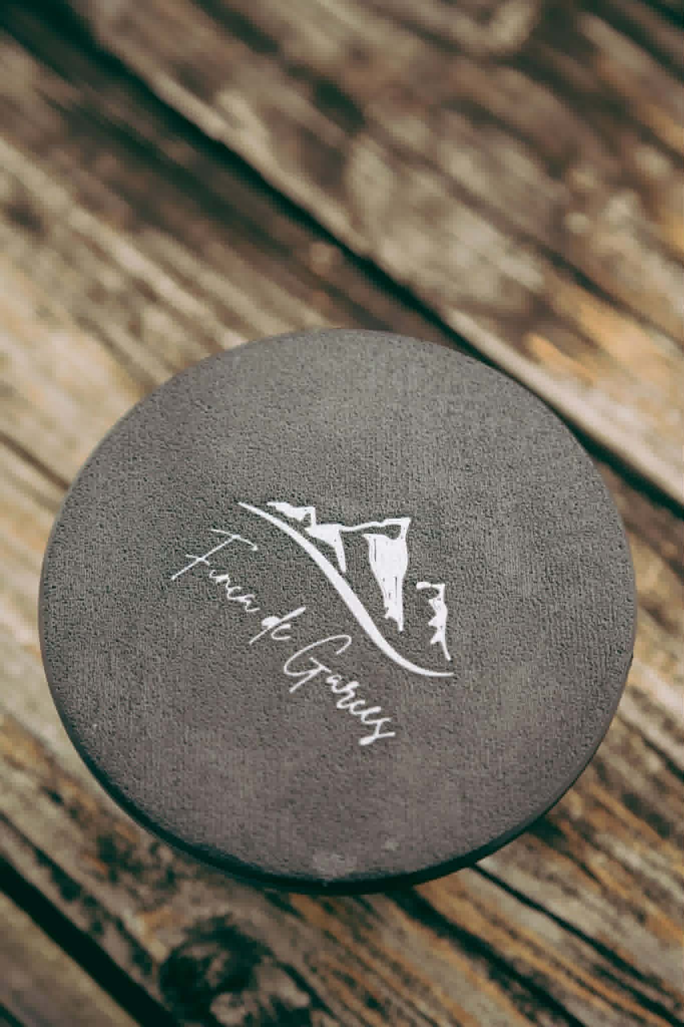 Coffee brand mark on coaster